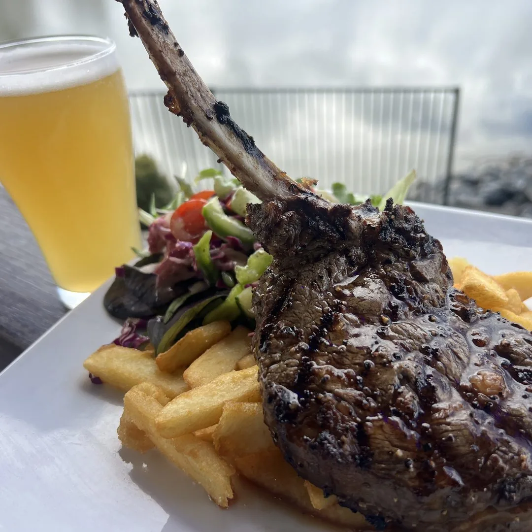 Lamb cutlet with chips and salad at Riverview Hotel